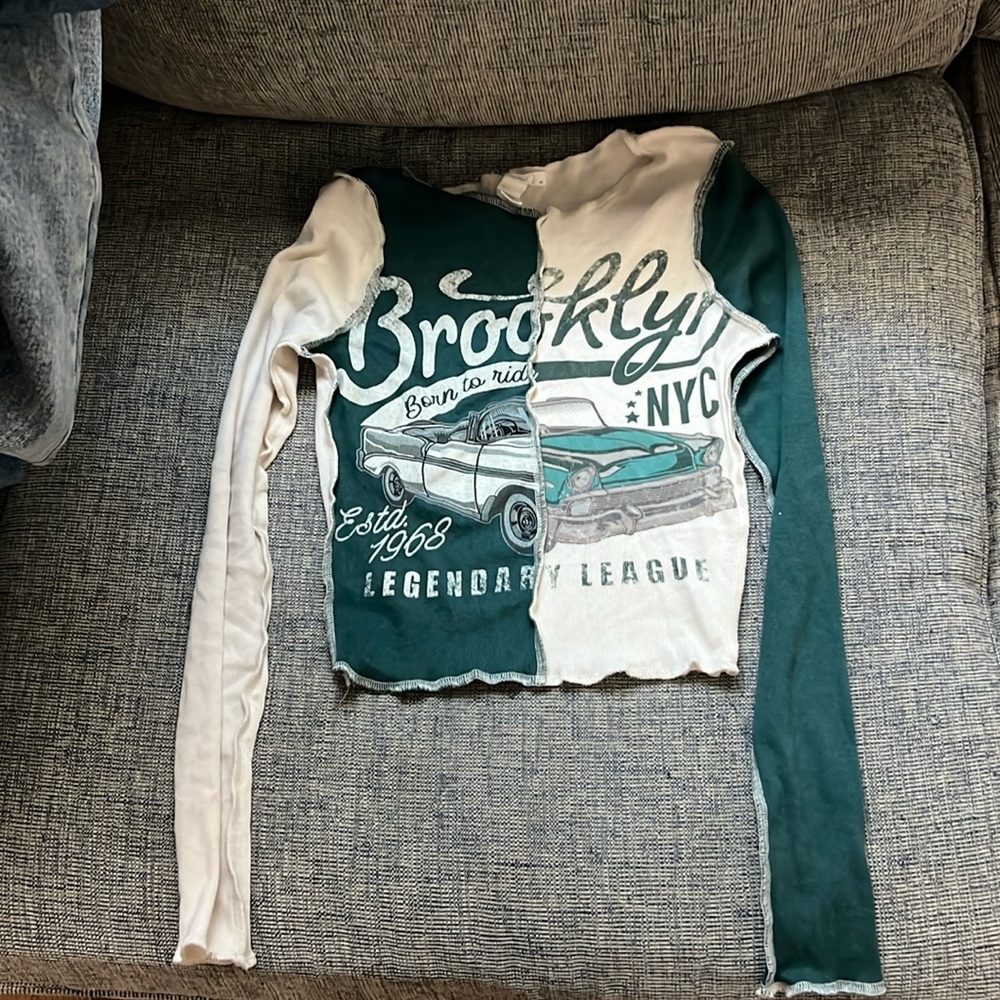 very cute cream and green long sleeve shirt